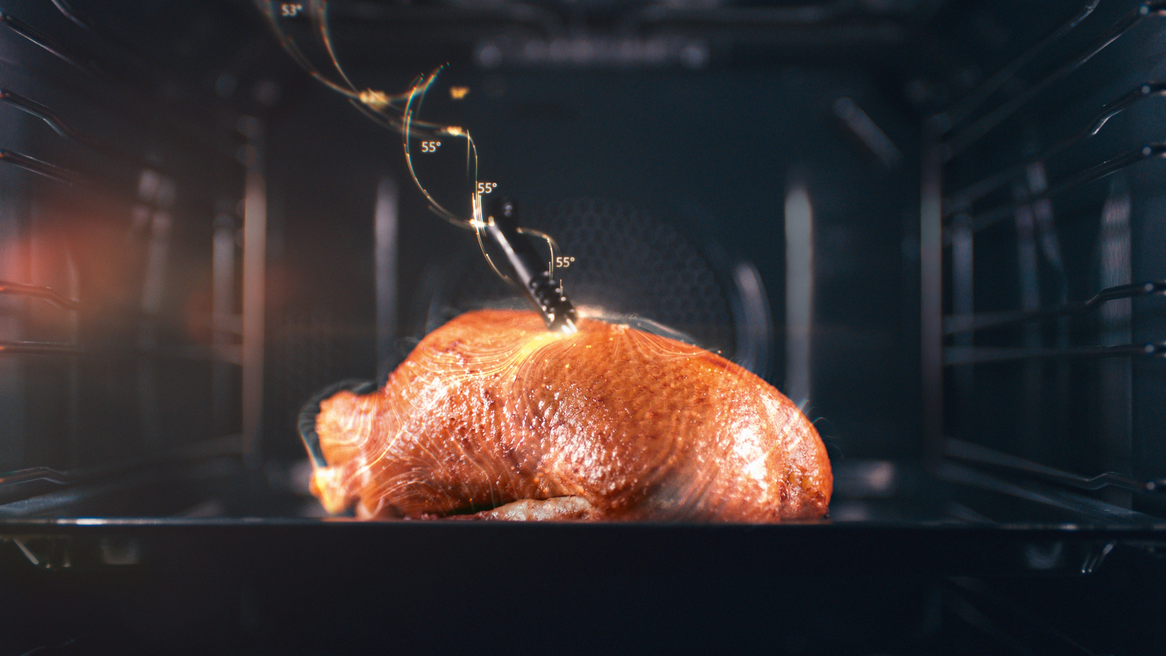 Chicken with a wireless precision probe inside a Miele oven Chicken with a wireless precision probe inside a Miele oven