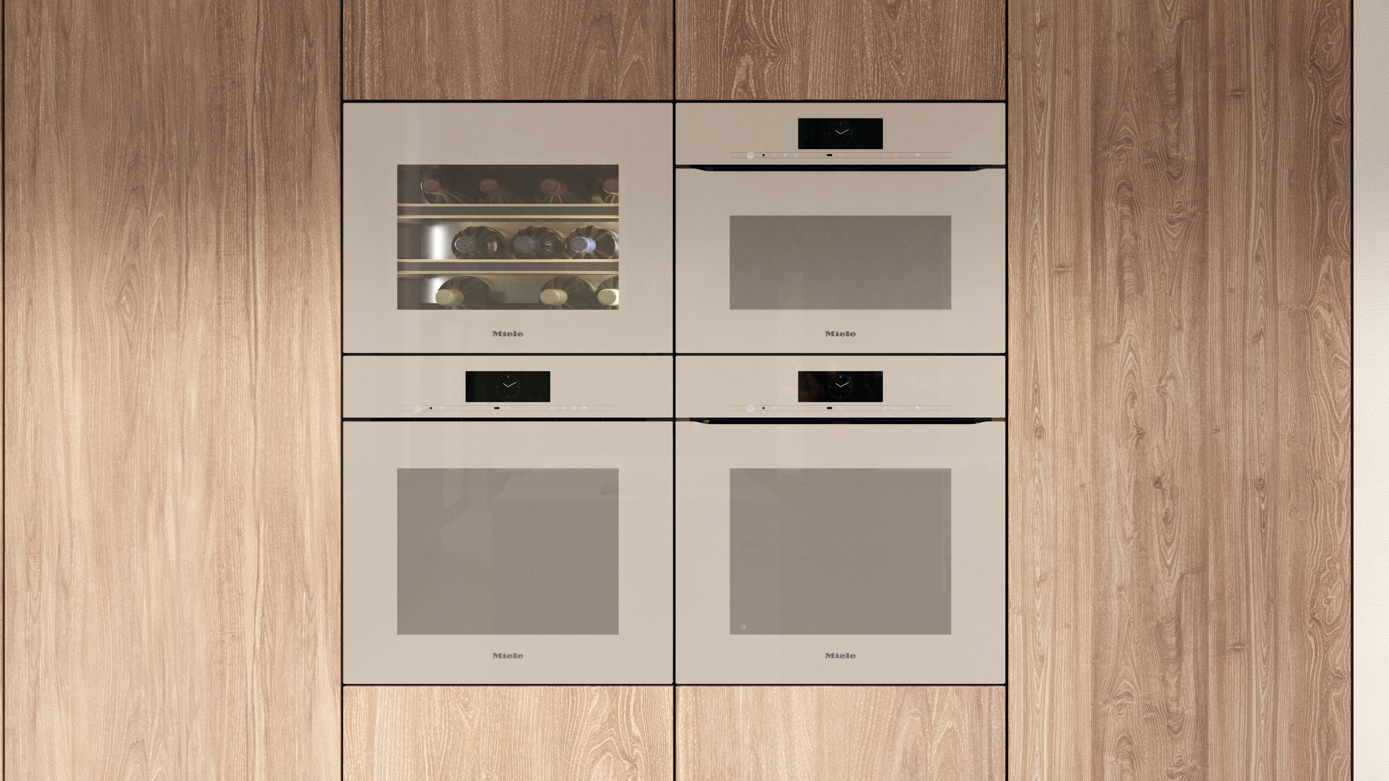 Wall of integrated Miele appliances in warm wood cabinetry: wine cooler at top left, three ovens with touch panels. Wall of integrated Miele appliances in warm wood cabinetry: wine cooler at top left, three ovens with touch panels.