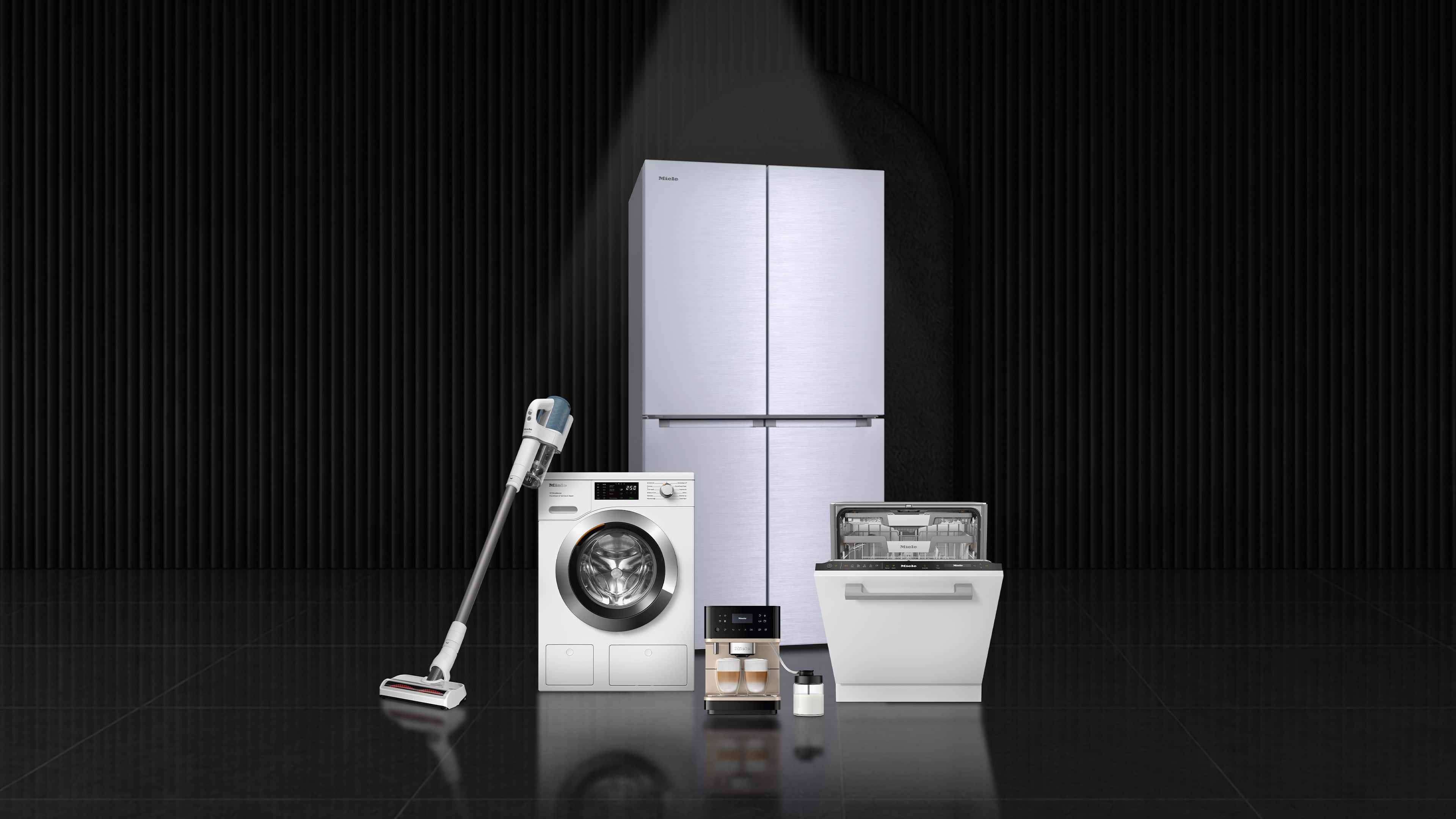 Modern appliance lineup: fridge, washer, dishwasher, coffee maker, and cordless vacuum on a dark studio backdrop. Modern appliance lineup: fridge, washer, dishwasher, coffee maker, and cordless vacuum on a dark studio backdrop.