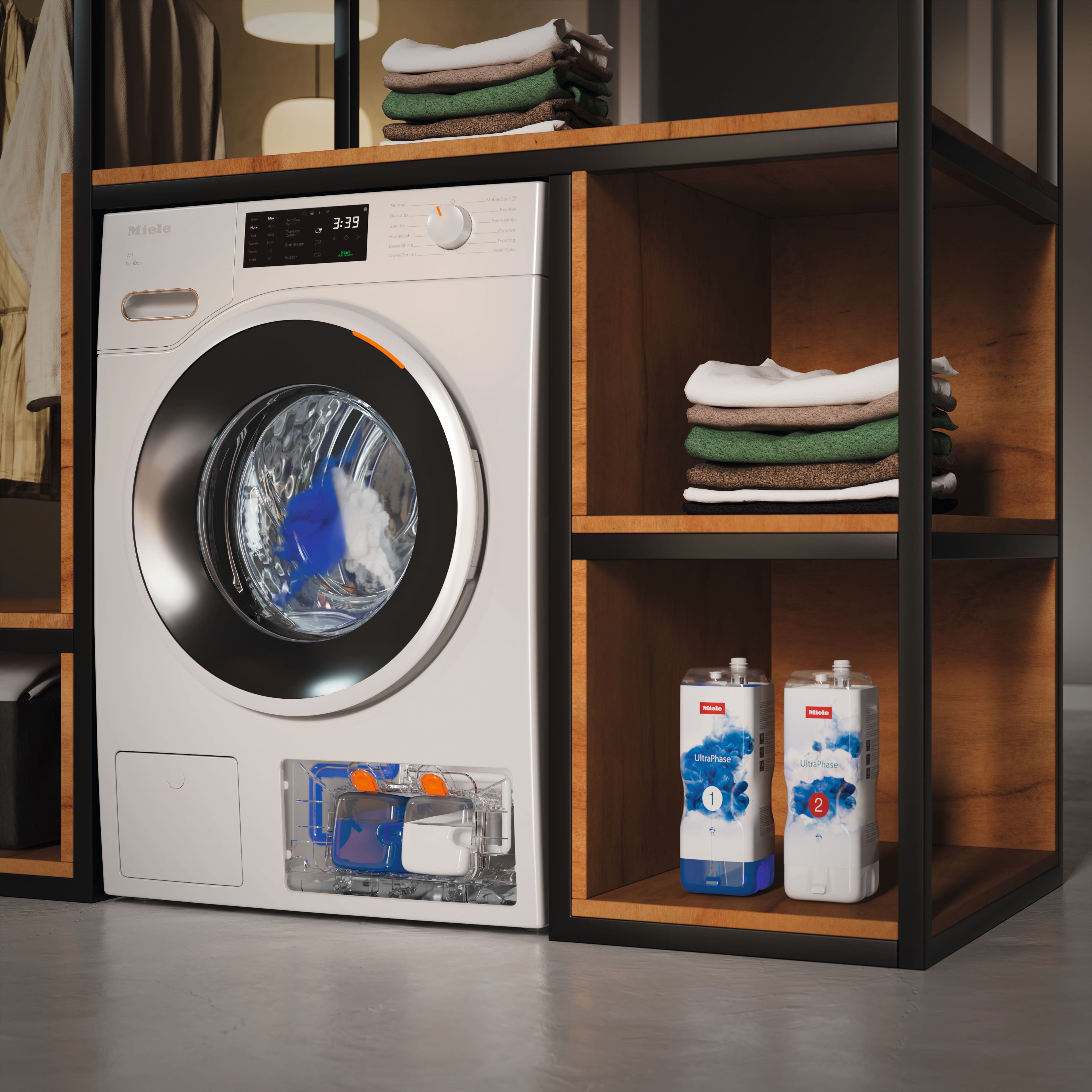 Detail of a Miele washing machine with its door open