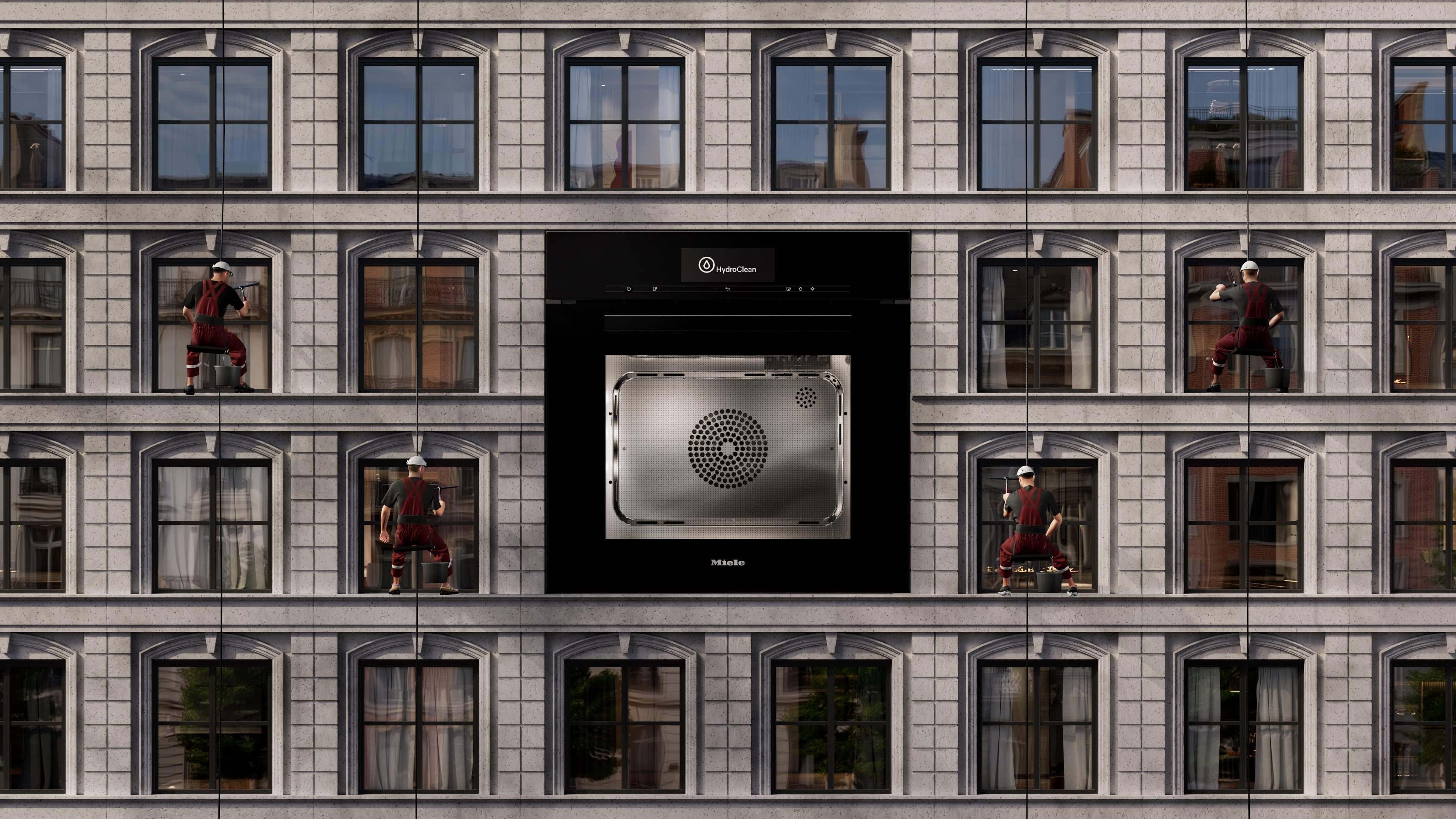 Visuel publicitaire d’un four Miele HydroClean au centre d’une façade d’immeuble avec des laveurs de vitres autour, illustrant le nettoyage automatique du four.