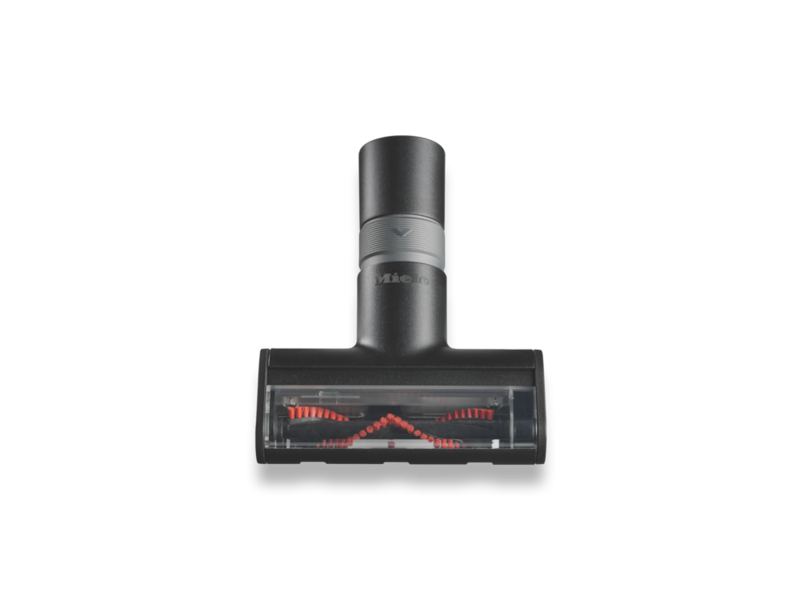 Compact handheld brush Compact handheld brush