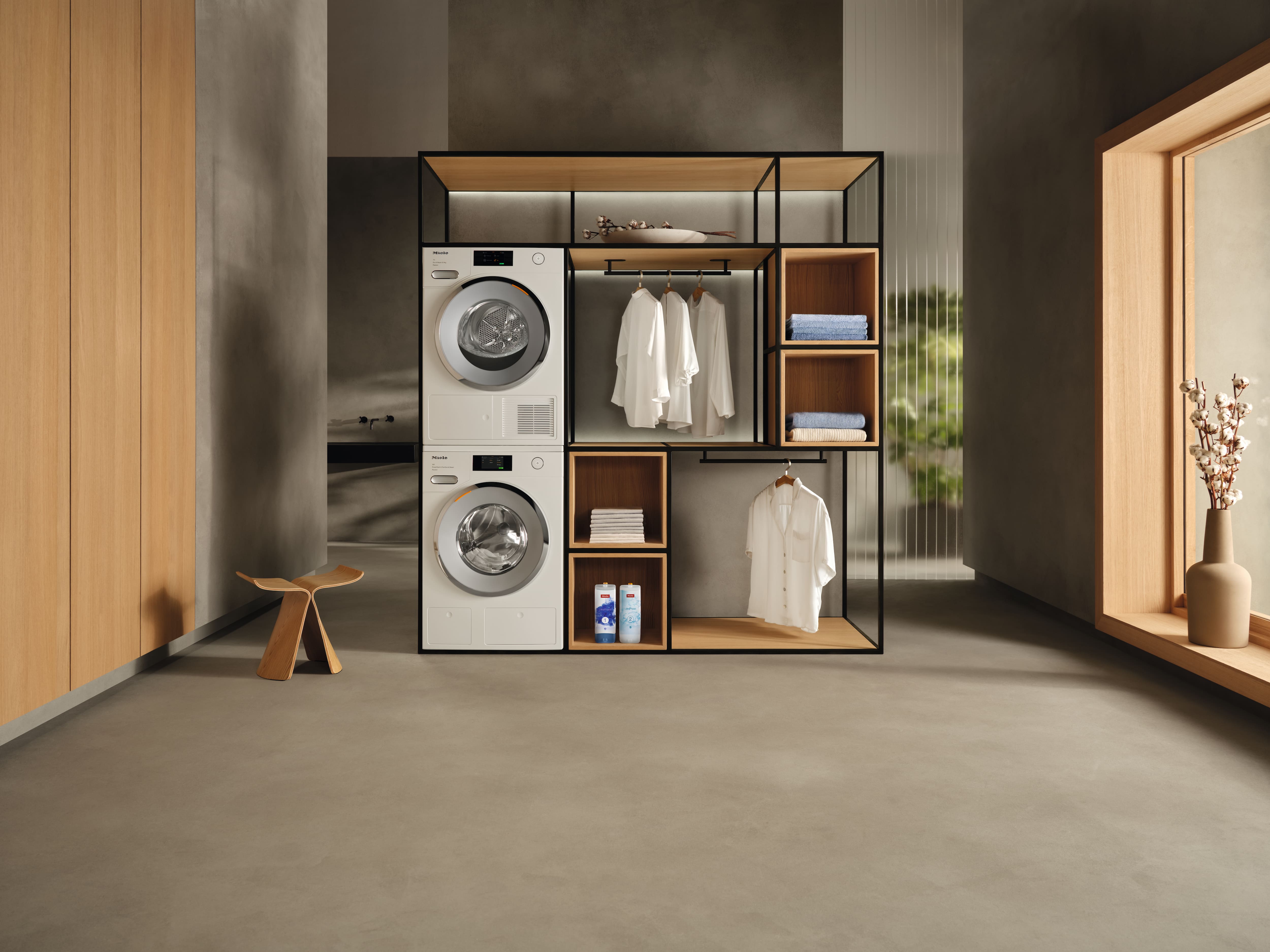Spacious laundry room with the washer and dryer machines