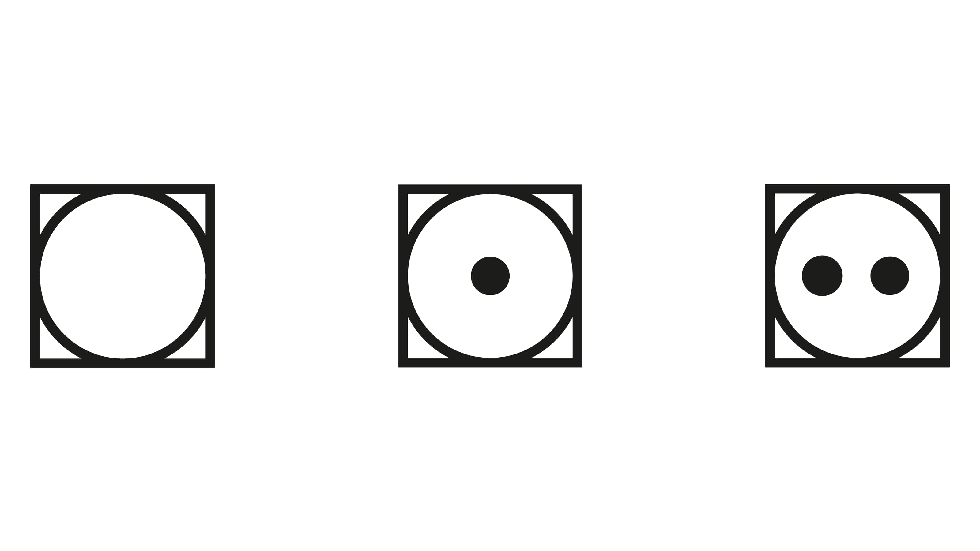 Three dryers: One without a dot, one with a dot and one with two dots in it