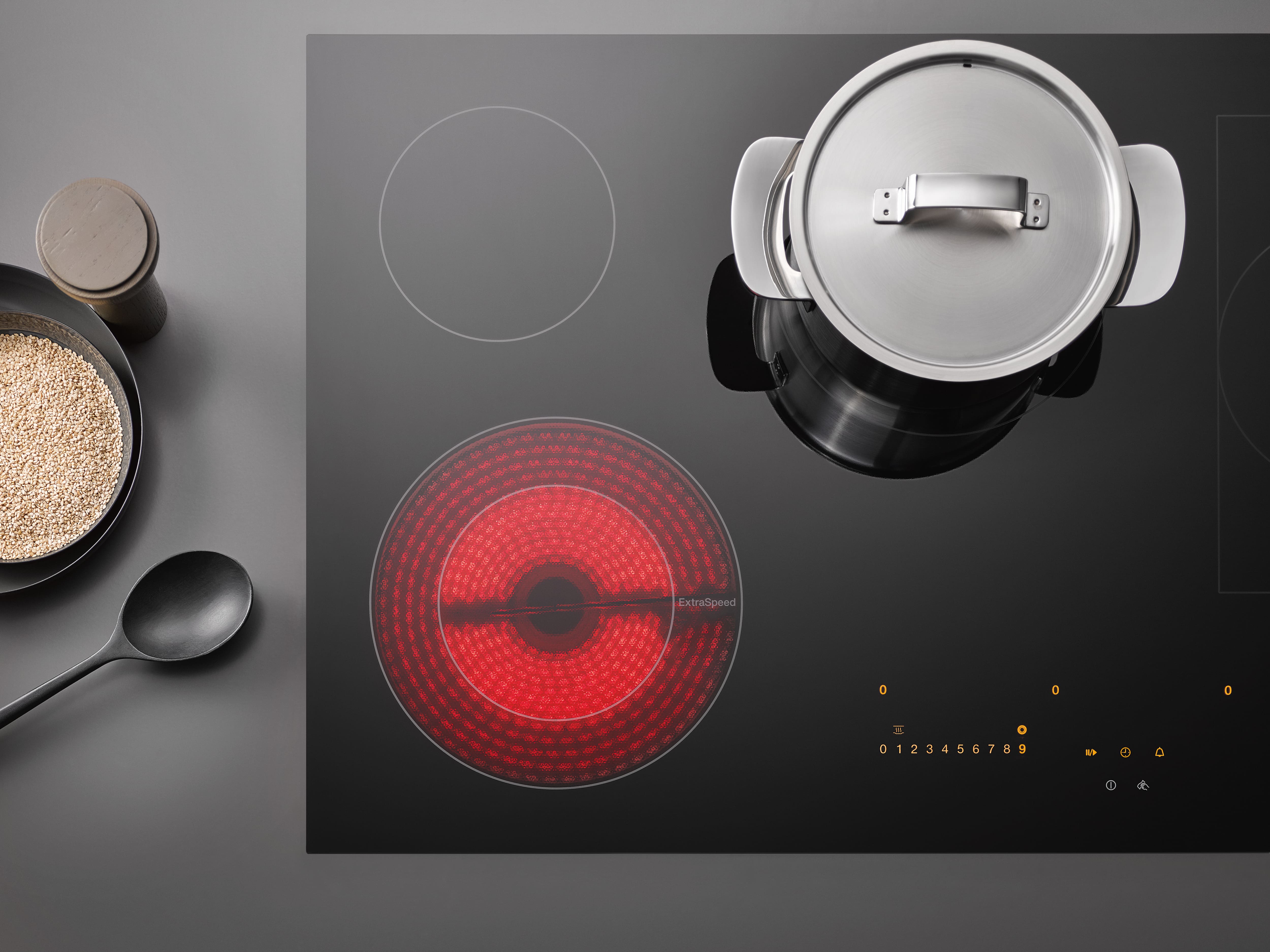 Electric ceramic hob viewed from above with one section on