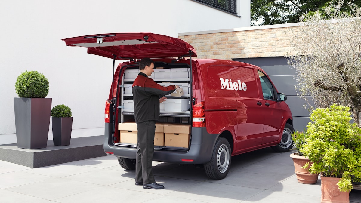 Miele expert arriving with Miele van at a home to make a visit