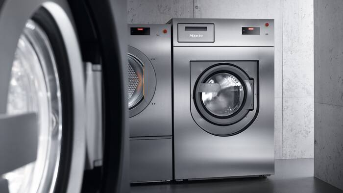 Benchmark Performance Plus washing machines in the laundry room