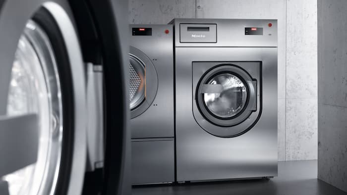 Benchmark Performance Plus washing machines in the laundry room