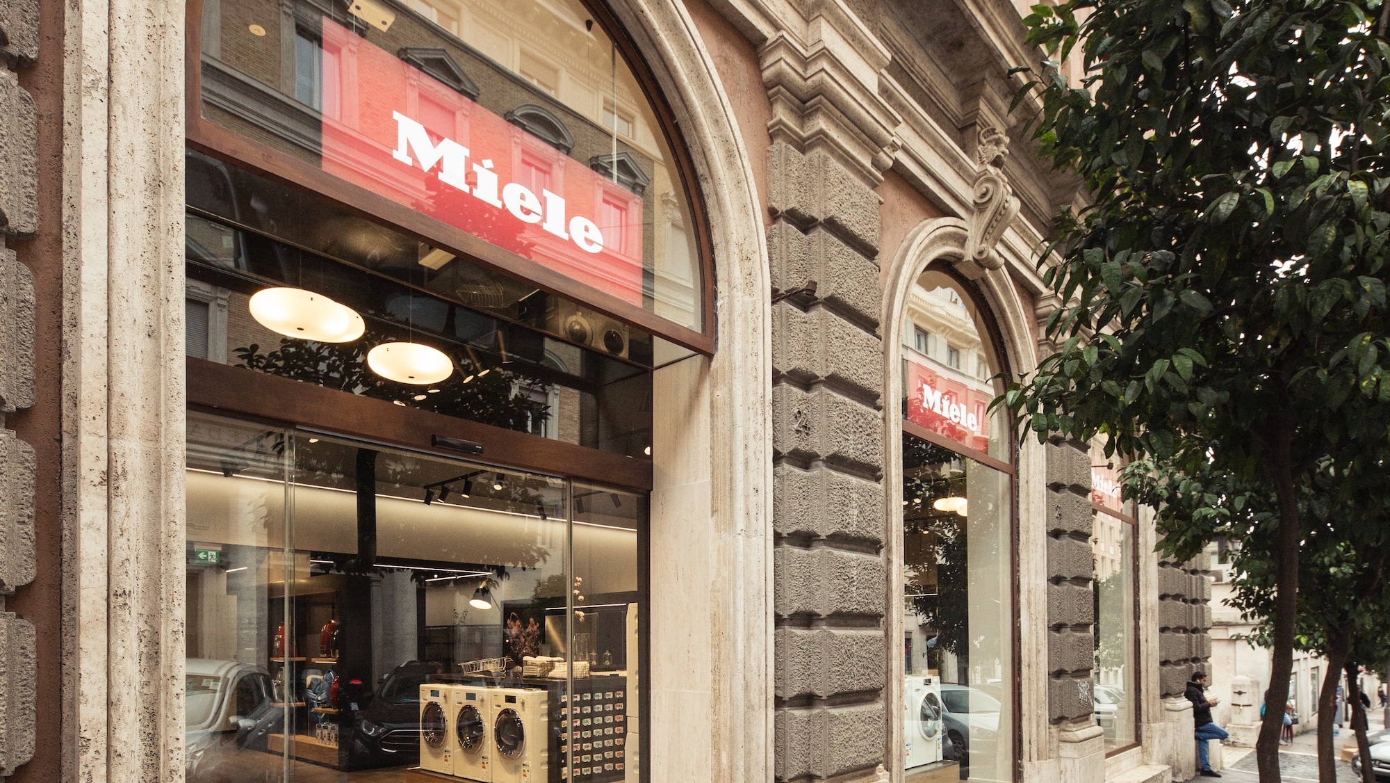 a Miele experience center exterior and its parking spots