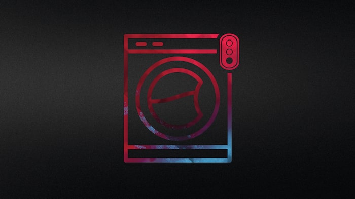 Abstrakti mustapunainen symboli, joka edustaa pesukonetta