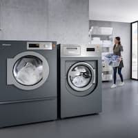 The new heat-pump dryers in a professional laundry room.