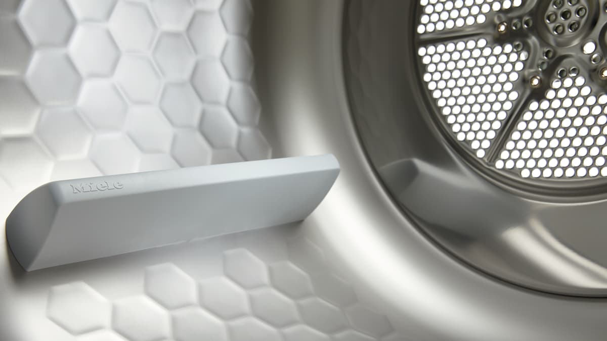 Close-up of tumble dryer drum.
