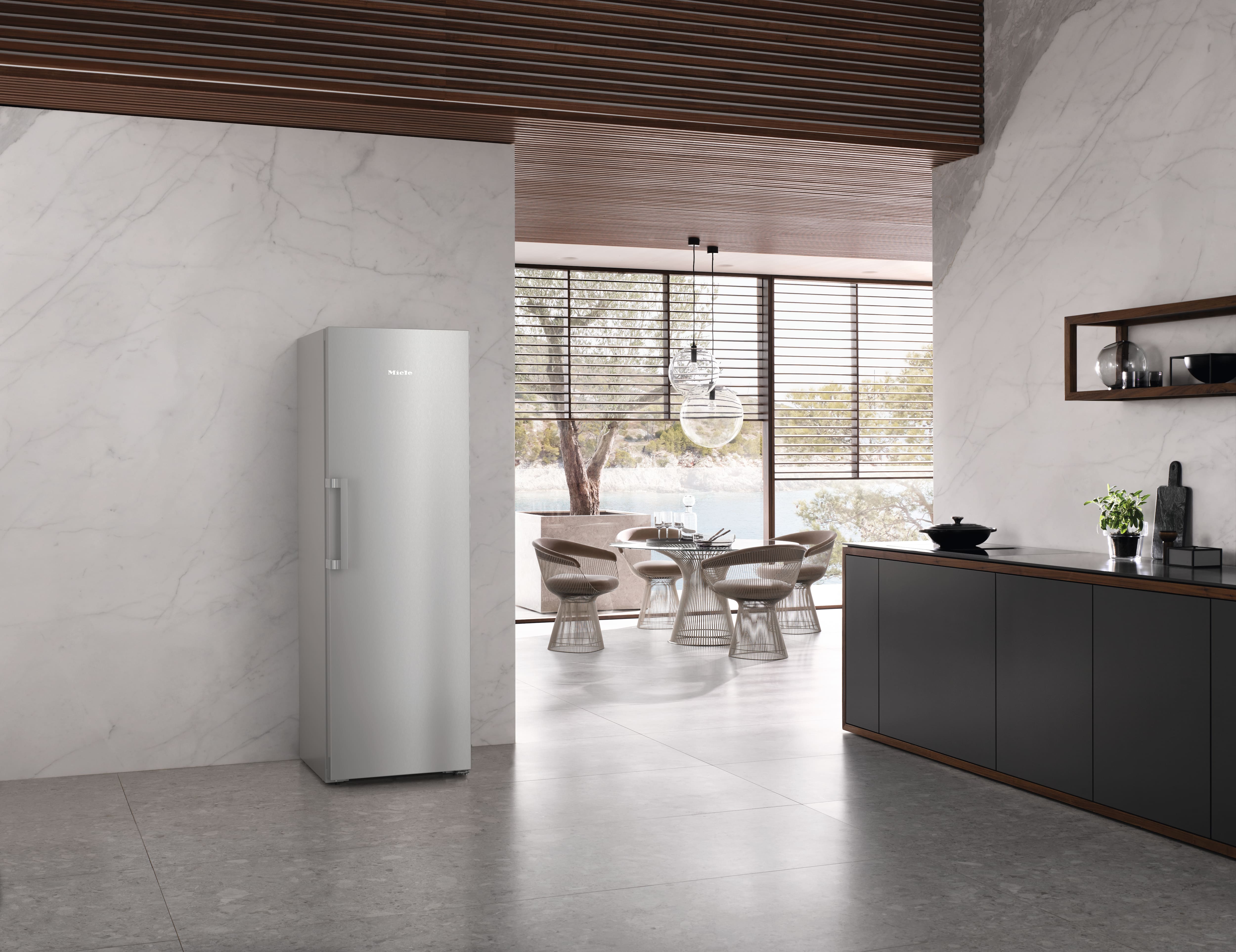 Open Miele Fridge in the kitchen enviroment 