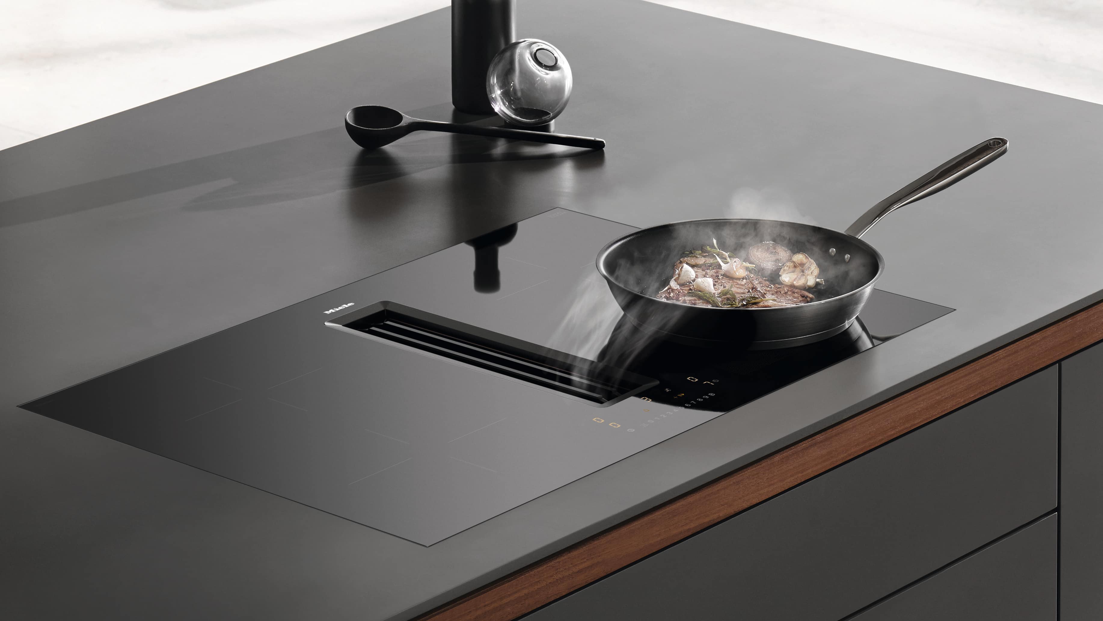 miele induction hob with extractor fan