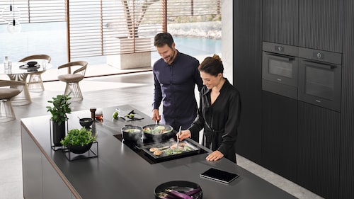 Features | | extraction Induction Product Miele with vapour hobs