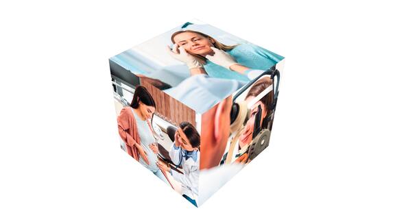 A cube with various photographic motifs can be seen. Various situations of patients in medical treatment are shown.
