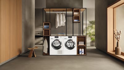 Image of a laundry room with MIele washing machine and tumble dryer