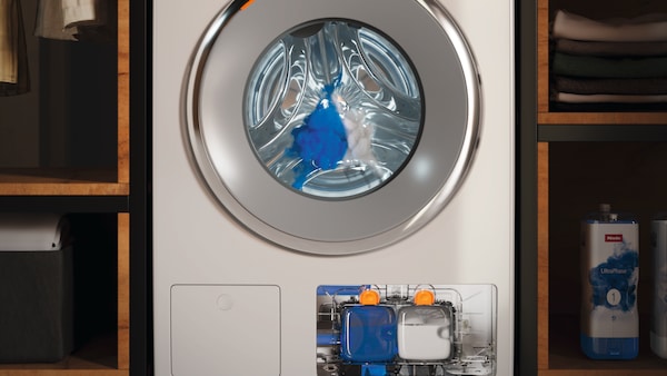 Miele washing machine showing the detergent inside