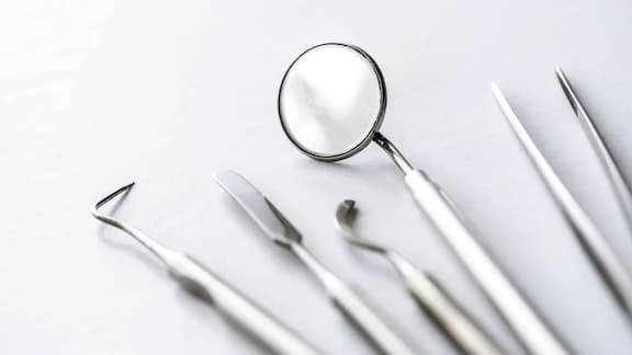 Dental instruments lying on counter