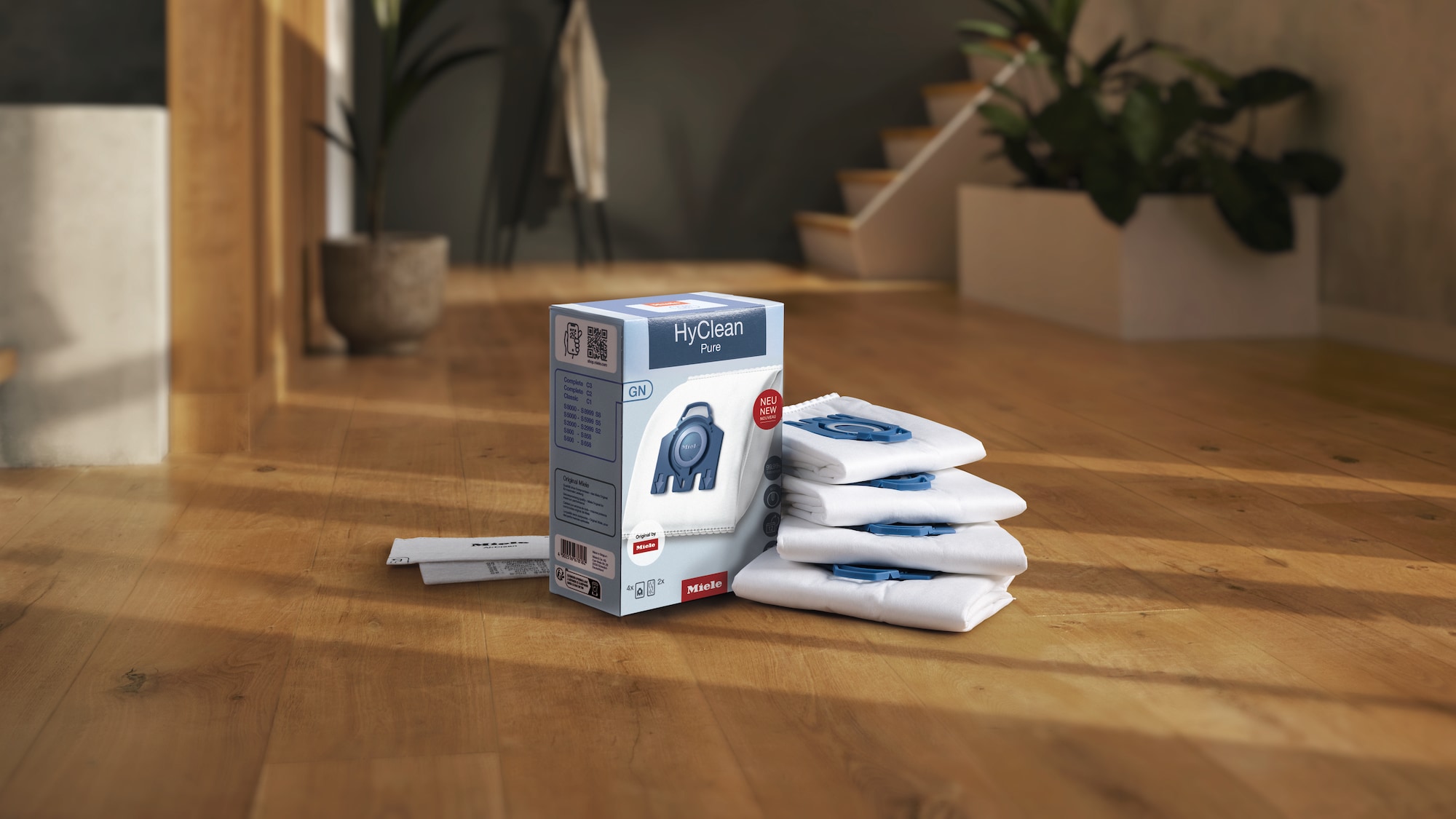 Miele washing machine with the automatic dosing system TwinDos, UltraPhase detergent and clothes