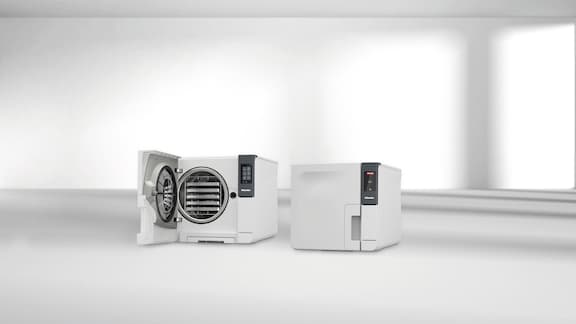 Cube steriliser by Miele Professional. Version with open door on the left, closed on the right.