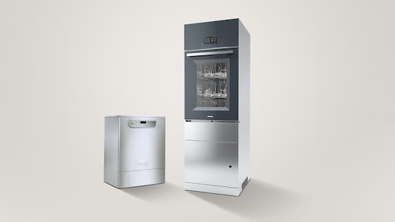 A PG 8583 undercounter laboratory glasswasher and a PLW 7111 SlimLine laboratory glasswasher are placed next to each other on a grey background.