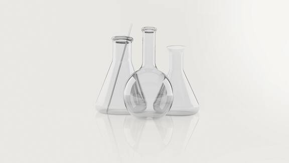 Laboratory glassware shown on a grey background