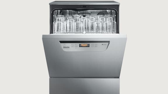 Half opened laboratory washer shown on a grey background.