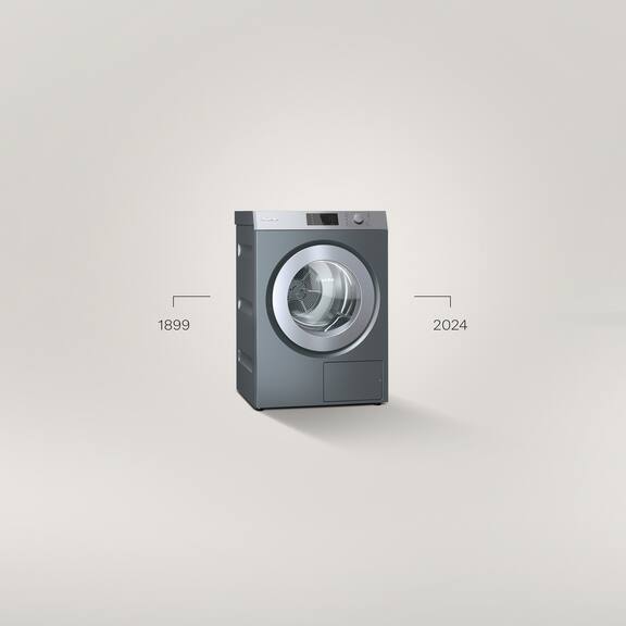 A Benchmark Performance PDR 510 dryer stands in front of a grey background
