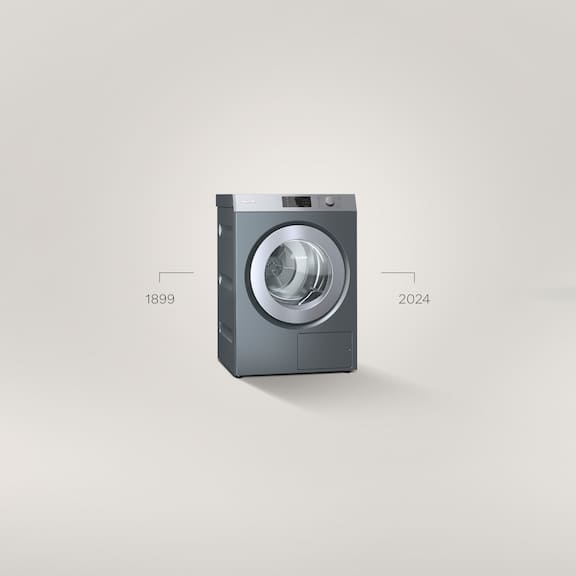 A Benchmark Performance PDR 510 dryer stands in front of a grey background