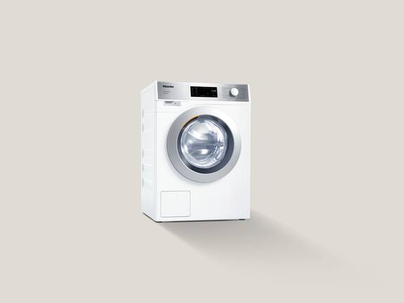 Mieles SmartBiz-tvättmaskin PWM 1108 står framför en grå bakgrund