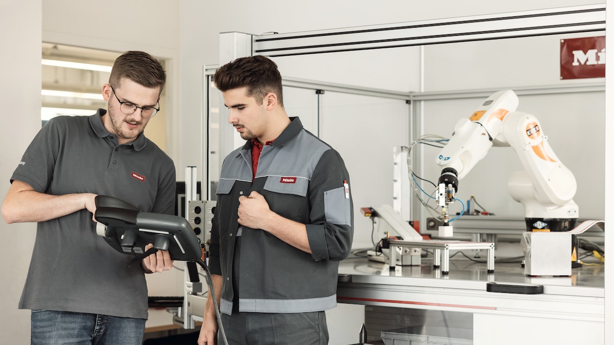 Miele experts testing vacuum parts