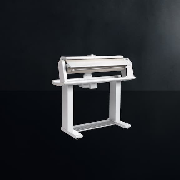 The Miele flat ironer HM 16-83 is displayed on a black background.