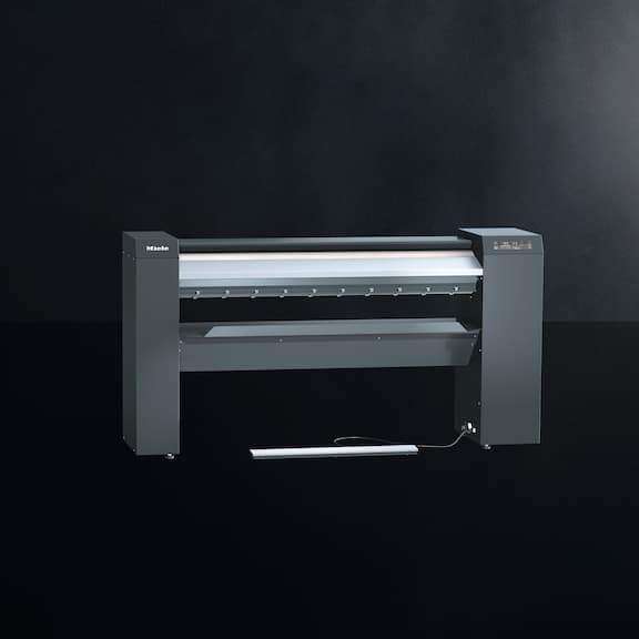 The Miele flat ironer PRI 214 is displayed on a black background.