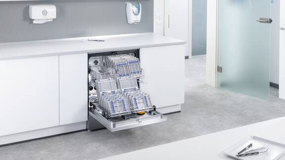 ExploreLine dental washer loaded with dental instruments