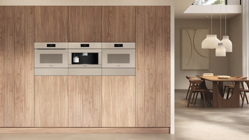 Pearl beige appliances in a light wood kitchen