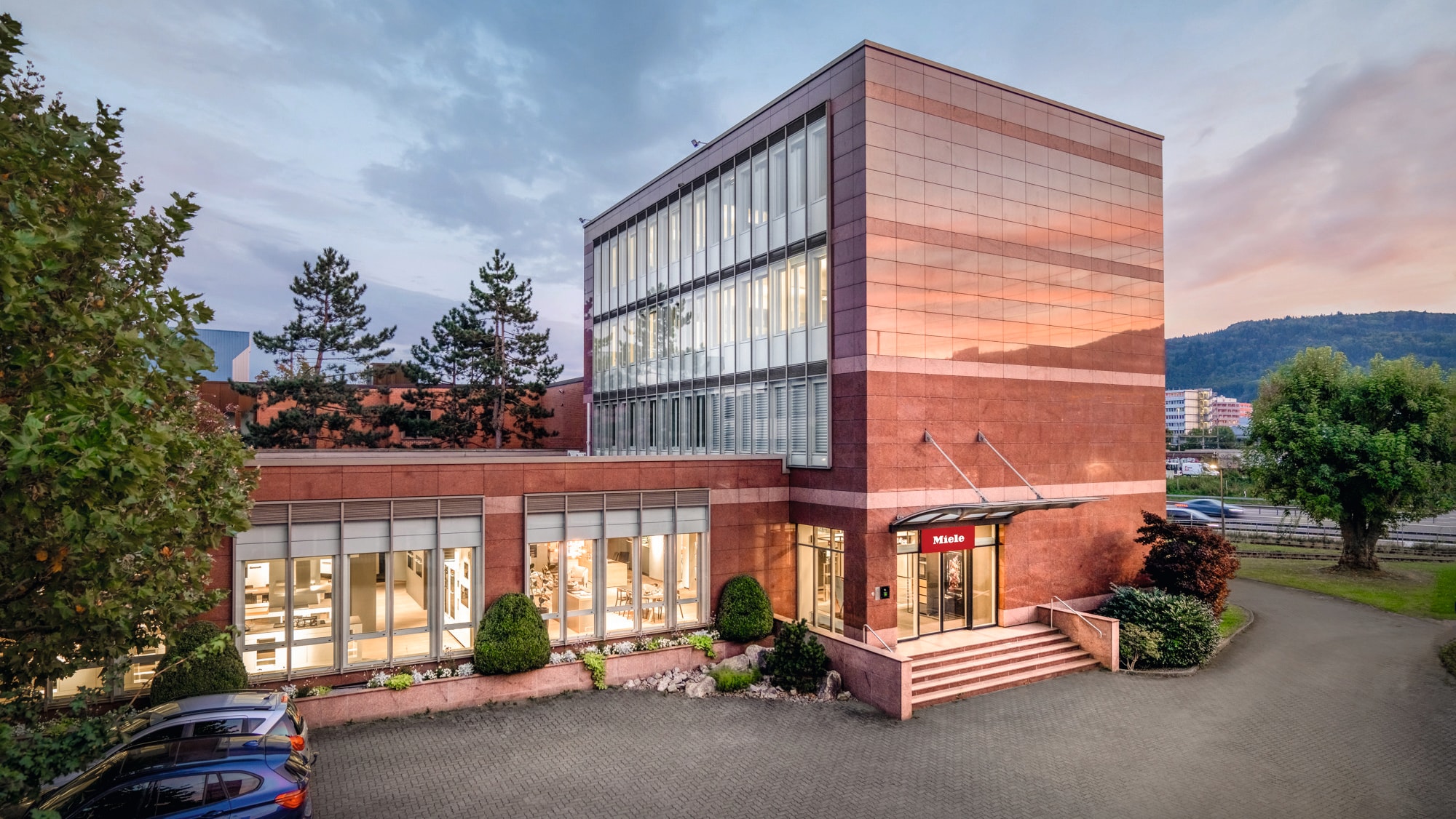 a Miele experience center exterior and its parking spots