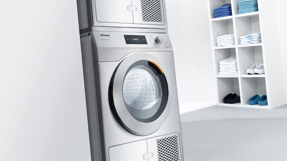 Miele Professional Little Giants washing machines in a clinic laundry
