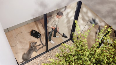 Image of a Miele vacuum cleaner in a living room