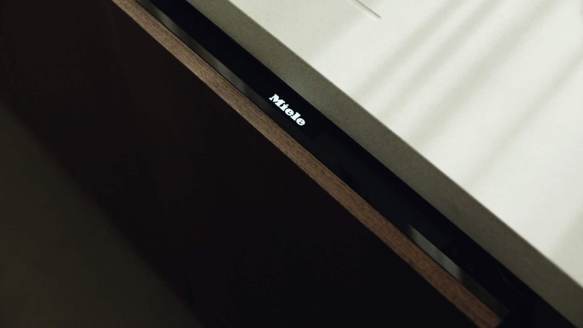 Close-up view of the dishwasher slightly opened