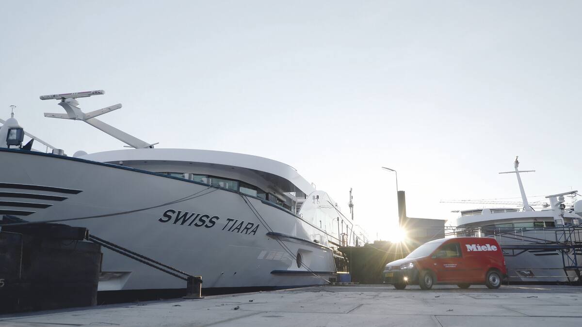 Customer service vehicle approaching a ship