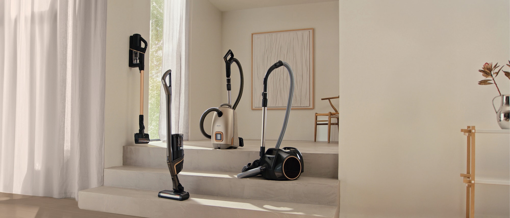 Miele vacuum cleaner next to a dog