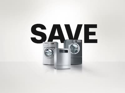 Promo for Miele Professional: 3 commercial machines – Benchmark PWM 912 washing machine, Benchmark PDR 914 tumble dryer and MasterLine PFD 404 dishwasher – against a neutral background. The lettering “SAVE” appears above it in large black letters.
