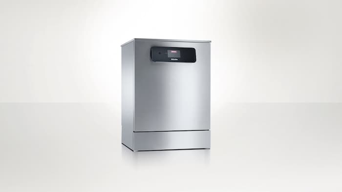 Miele Professional MasterLine PFD 404 dishwasher against a neutral background. 