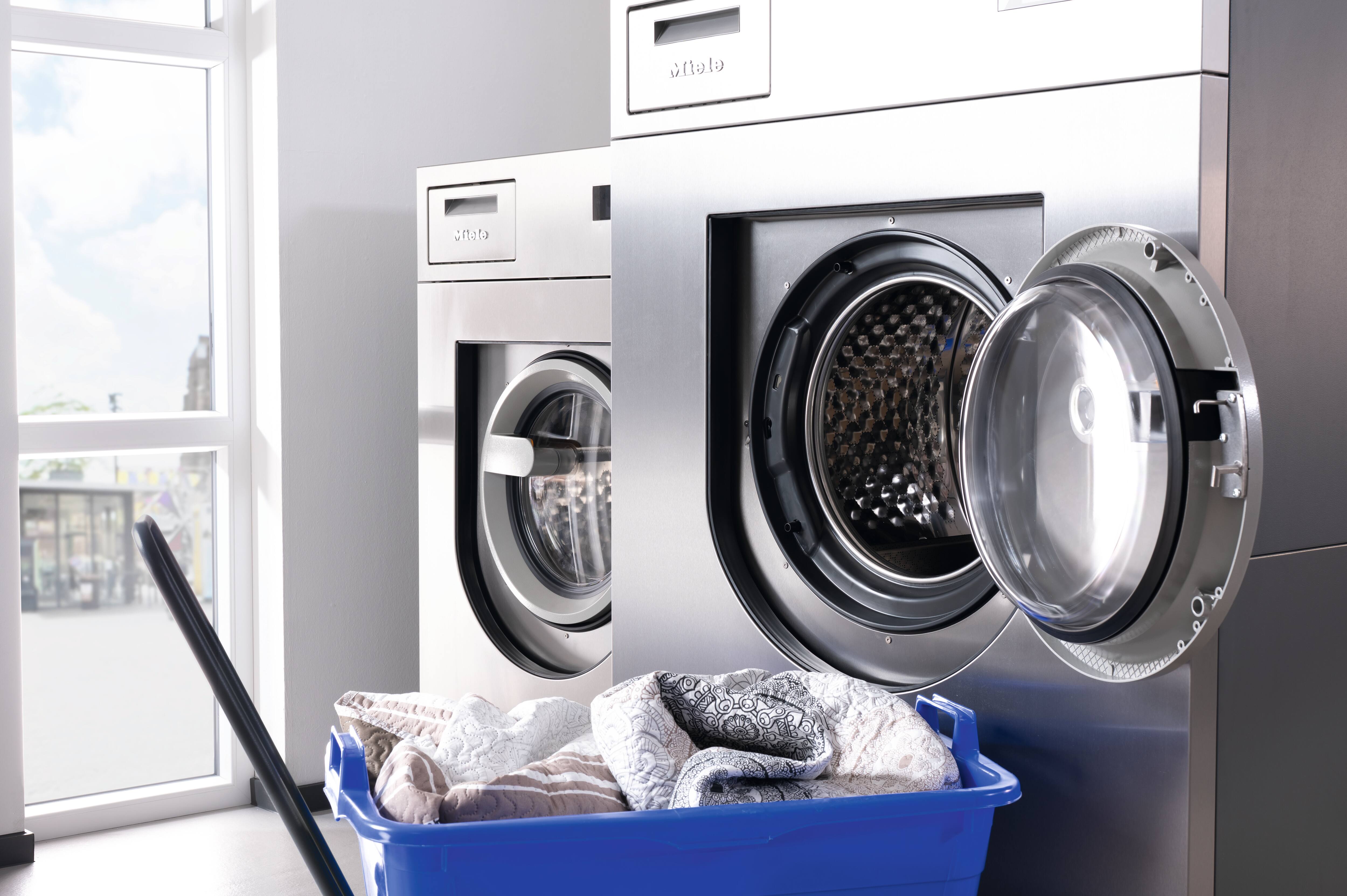 BenchMark Washing Machine and Dryer with Basket of Linen
