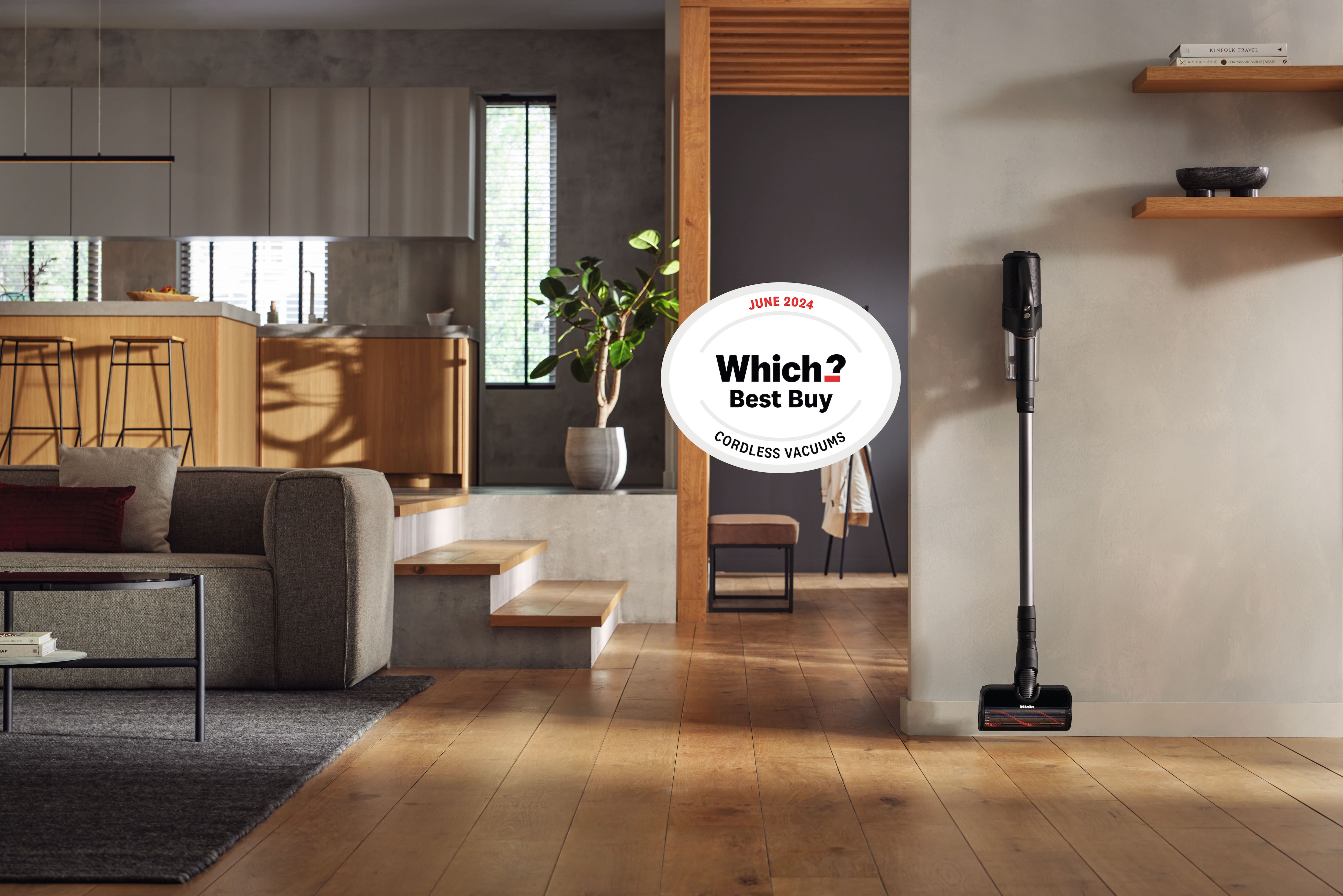 A Miele Duoflex stored on the wall of the living room