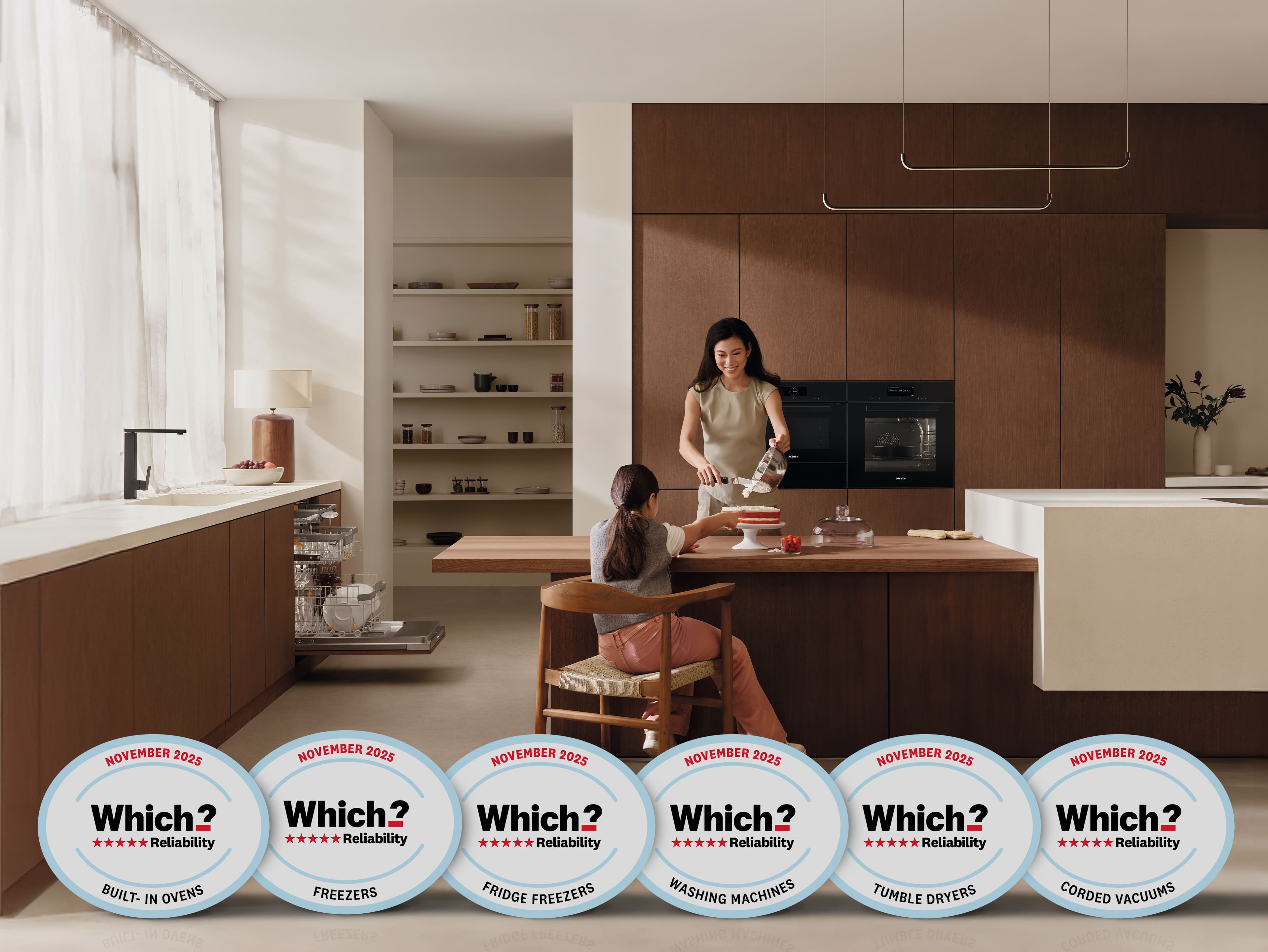 Woman and daughter baking in a modern kitchen with Miele appliances. Woman and daughter baking in a modern kitchen with Miele appliances.