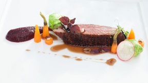 Roasted French Duck Breast with beetroot purée, black garlic sauce and baby carrots
